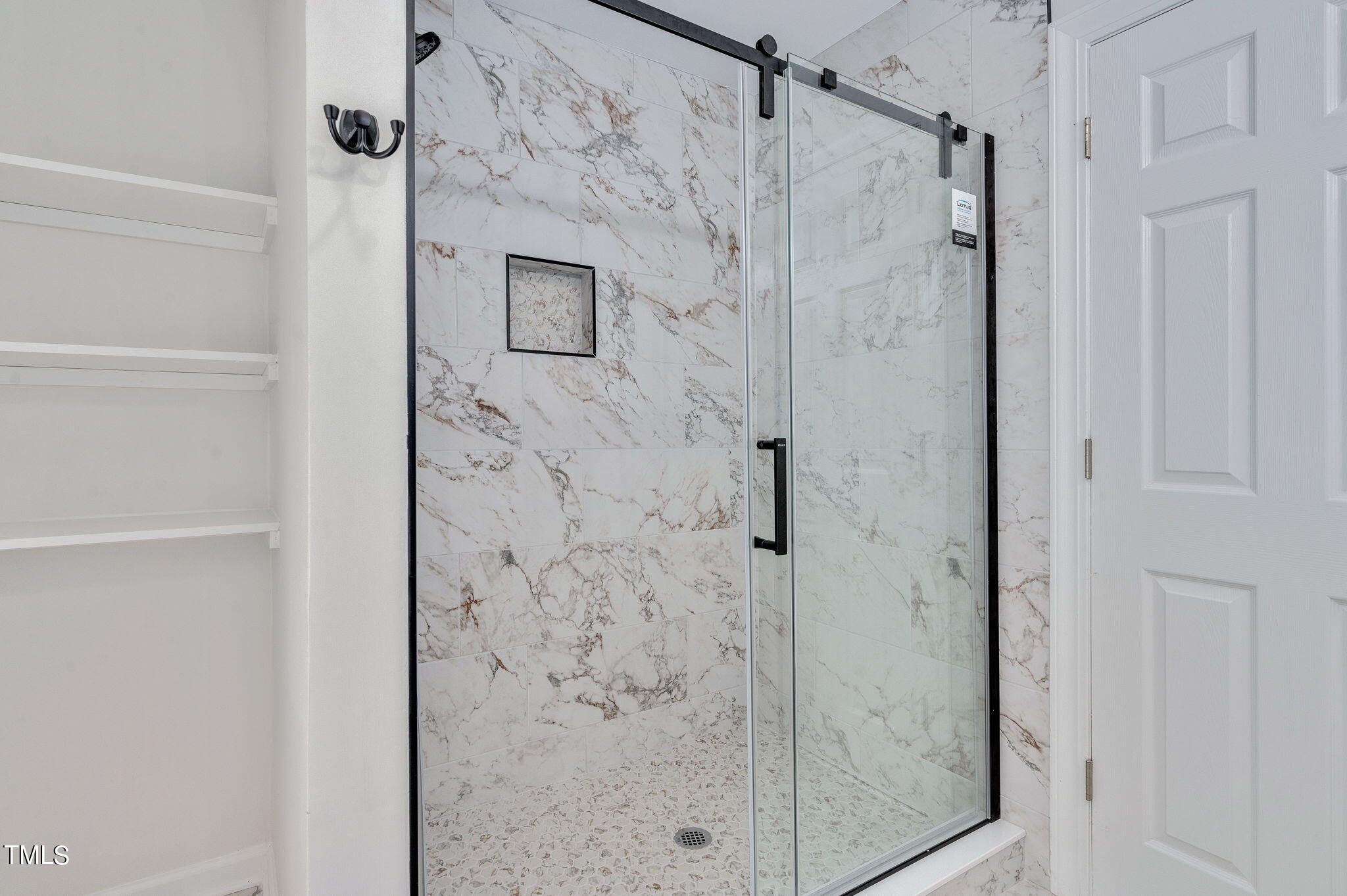 3912 Kildaire Farm Road Apex, NC 27539 - Photo 25 of 37 a bathroom with a shower