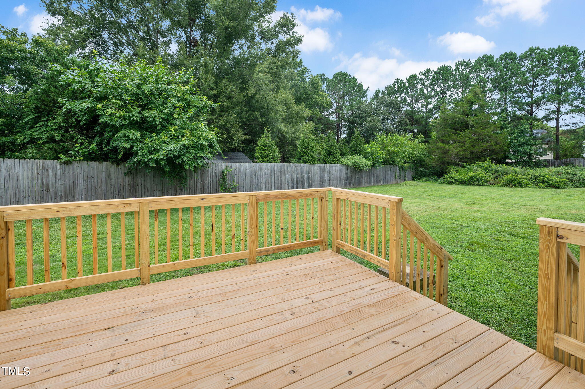 3912 Kildaire Farm Road Apex, NC 27539 - Photo 33 of 37 a view of deck with wooden floor and fence