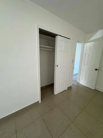 an empty room with a door