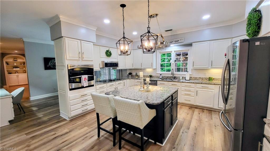 7035 Skylark Road Pfafftown, NC 27040 - Photo 2 of 47 Entertainer’s Dream Kitchen with Exceptional Pantry Space!