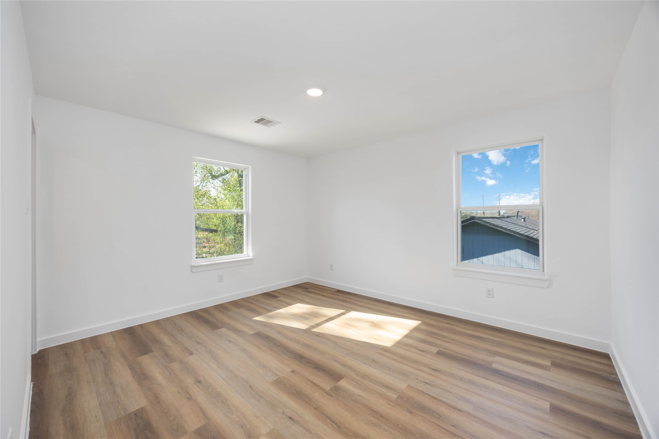 5811 Senior Street Houston, TX 77016 - Photo 9 of 13 an empty room with a window