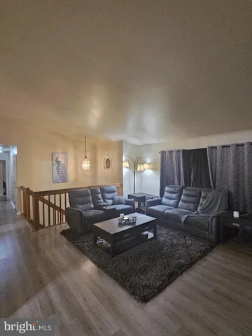 a bedroom with a bed and a table