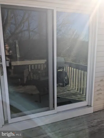 a view of a bathroom from the hallway