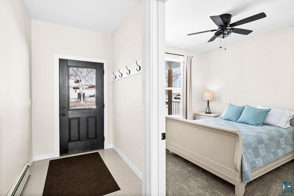 2236 Hoover Street Duluth, MN 55811 - Photo 21 of 52 Bedroom with a baseboard radiator and a ceiling fan