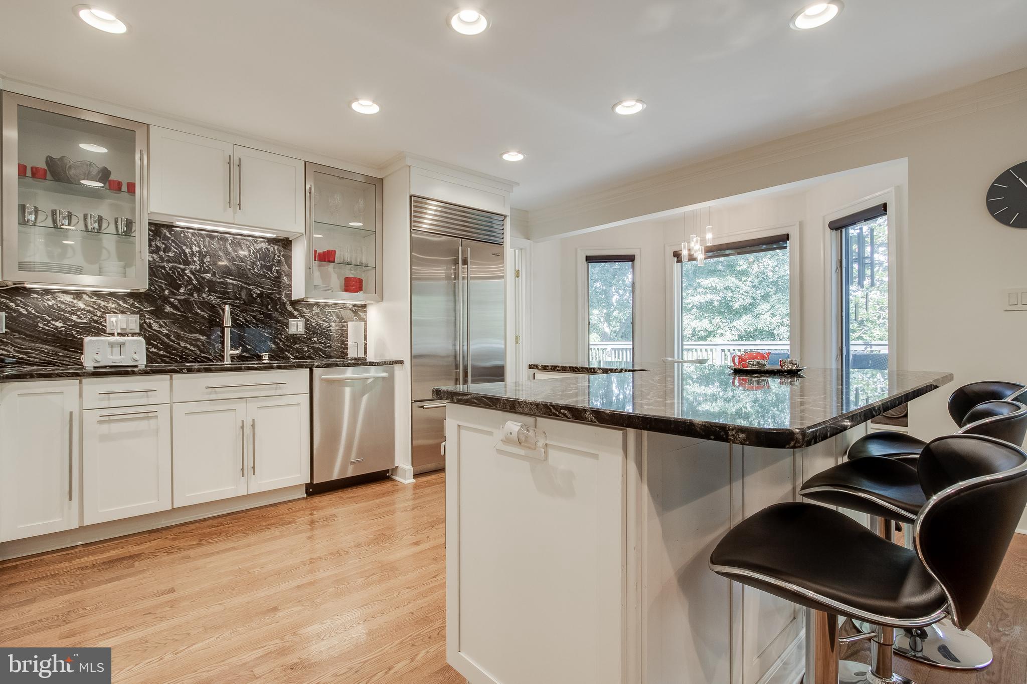 7346 Hooking Road McLean, VA 22101 - Photo 16 of 53 breakfast bar w/stools & another side of kit.