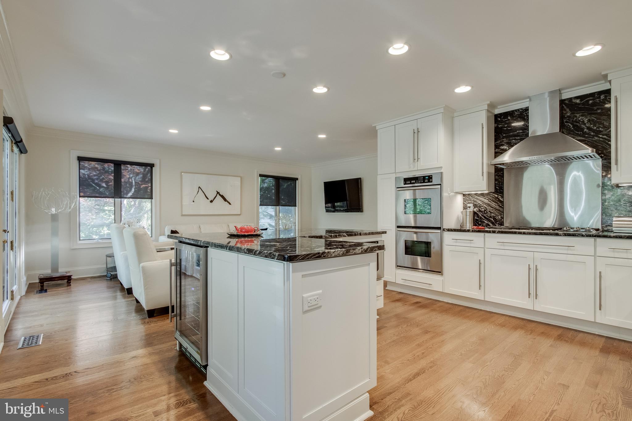 7346 Hooking Road McLean, VA 22101 - Photo 18 of 53 slight view of special wine fridge and fam. rm.