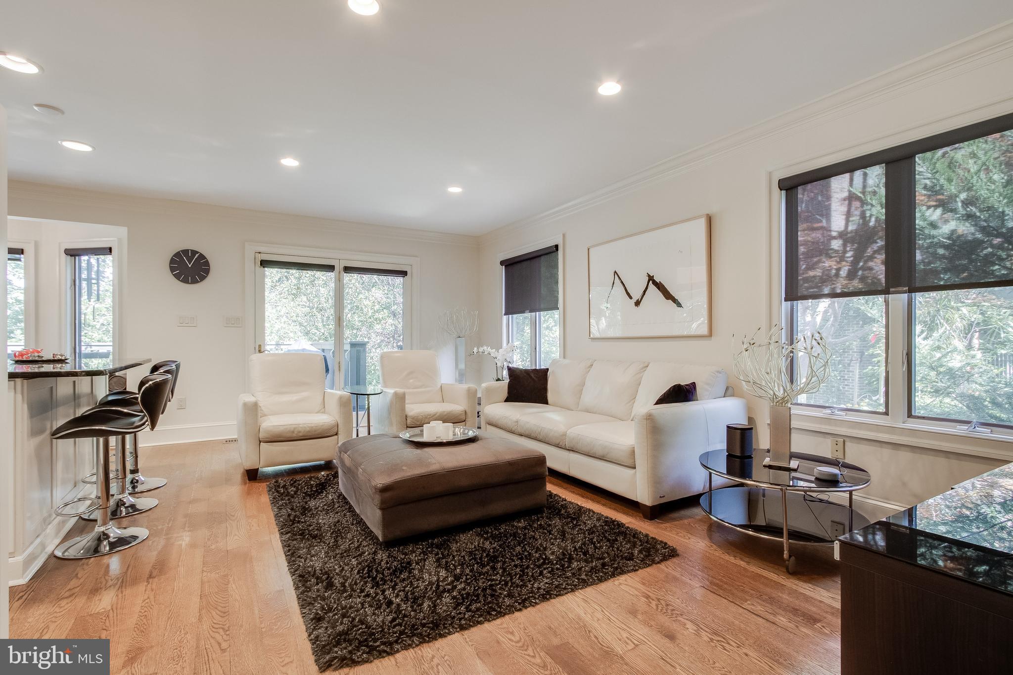 7346 Hooking Road McLean, VA 22101 - Photo 20 of 53 family room with views of doors leading to deck