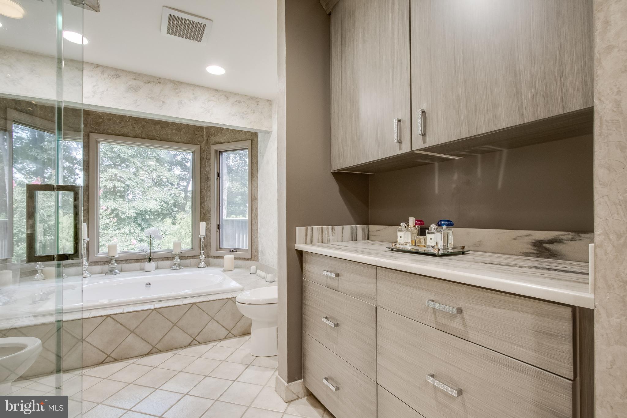 7346 Hooking Road McLean, VA 22101 - Photo 26 of 53 Additional vanity and storage. Counter top Marble
