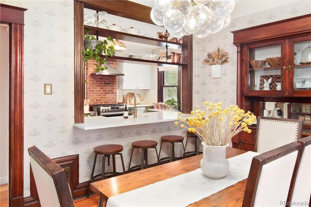 a kitchen with a stove and a cabinet