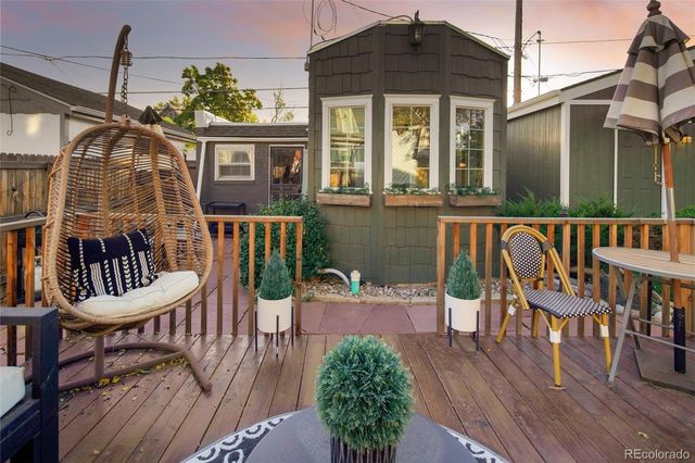 a kitchen with stainless steel appliances granite countertop a refrigerator a stove and a microwave