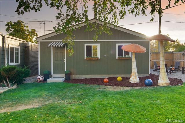 a room with gym equipment and a flat screen tv