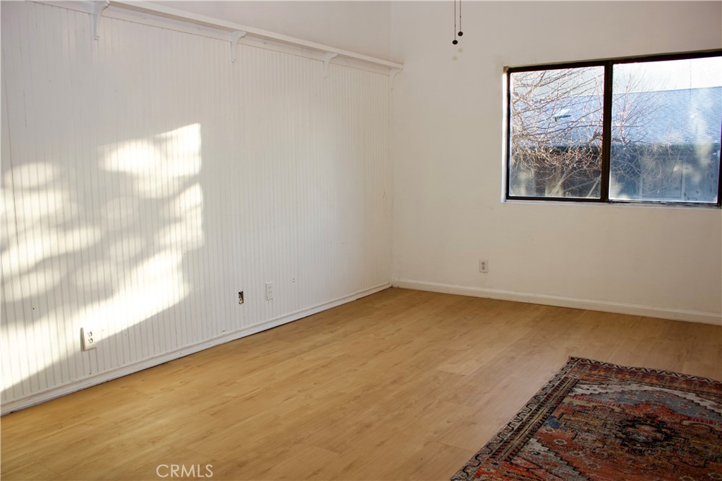 19908 Bear Valley Road Hidden Valley Lake, CA 95467 - Photo 12 of 50 a view of a room with wooden floor and windows