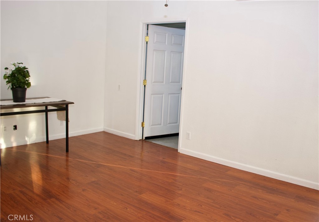 19908 Bear Valley Road Hidden Valley Lake, CA 95467 - Photo 15 of 50 a view of a hallway with wooden floor