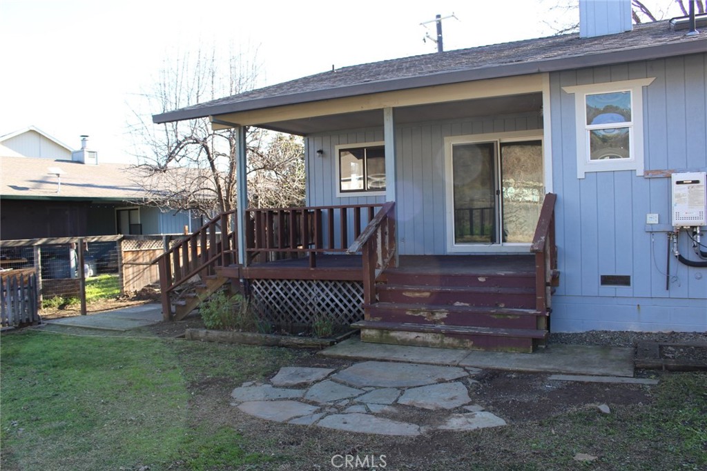 19908 Bear Valley Road Hidden Valley Lake, CA 95467 - Photo 16 of 50 a front view of a house with a yard