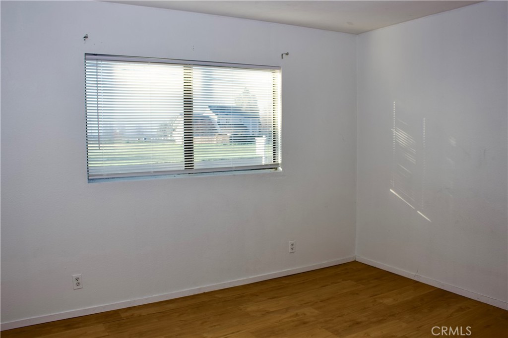 19908 Bear Valley Road Hidden Valley Lake, CA 95467 - Photo 43 of 50 an empty room with a window