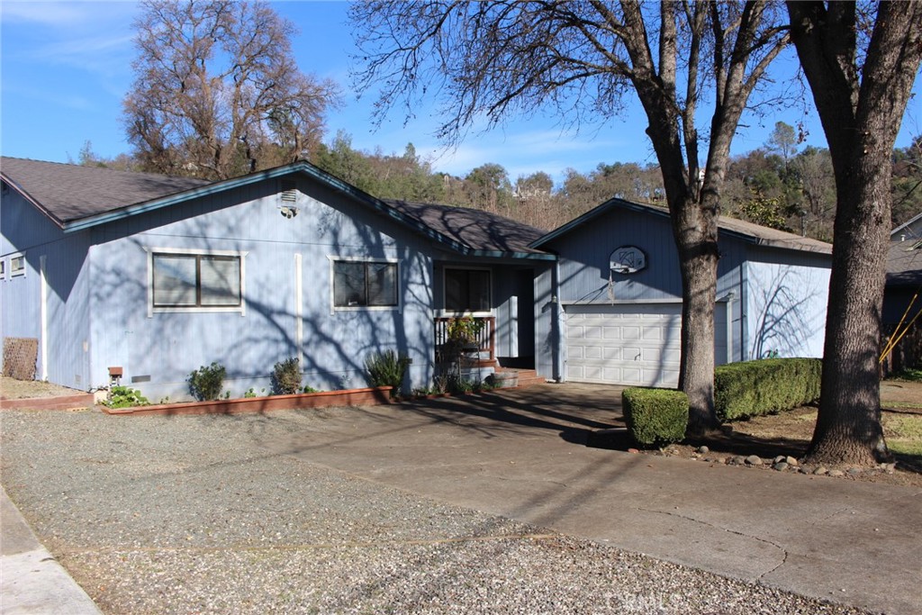 19908 Bear Valley Road Hidden Valley Lake, CA 95467 - Photo 46 of 50 a view of a house with a patio