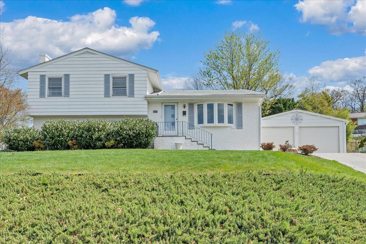 2515 Northminster Road Northwest Roanoke, VA 24012 - Photo 1 of 54 a view of a house with a garden