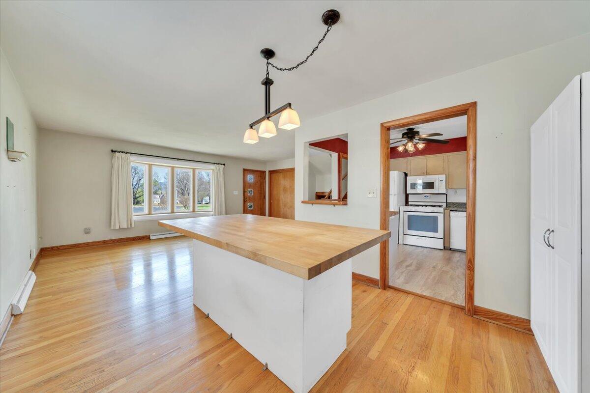 2515 Northminster Road Northwest Roanoke, VA 24012 - Photo 12 of 54 a view of a kitchen with wooden floor and window