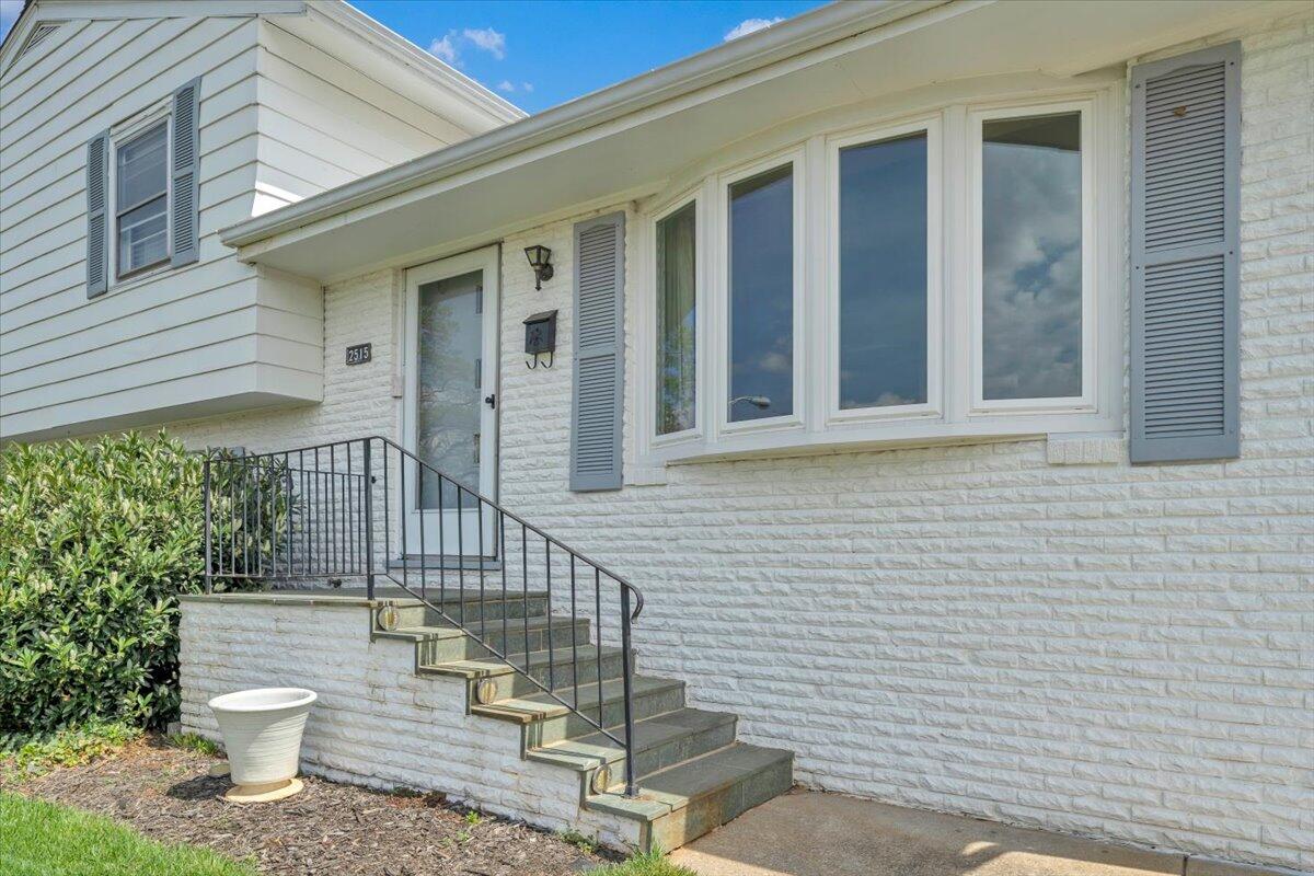 2515 Northminster Road Northwest Roanoke, VA 24012 - Photo 2 of 54 a front view of a house with a chairs