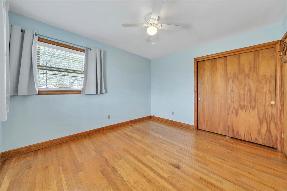 2515 Northminster Road Northwest Roanoke, VA 24012 - Photo 23 of 54 wooden floor in an empty room with a window