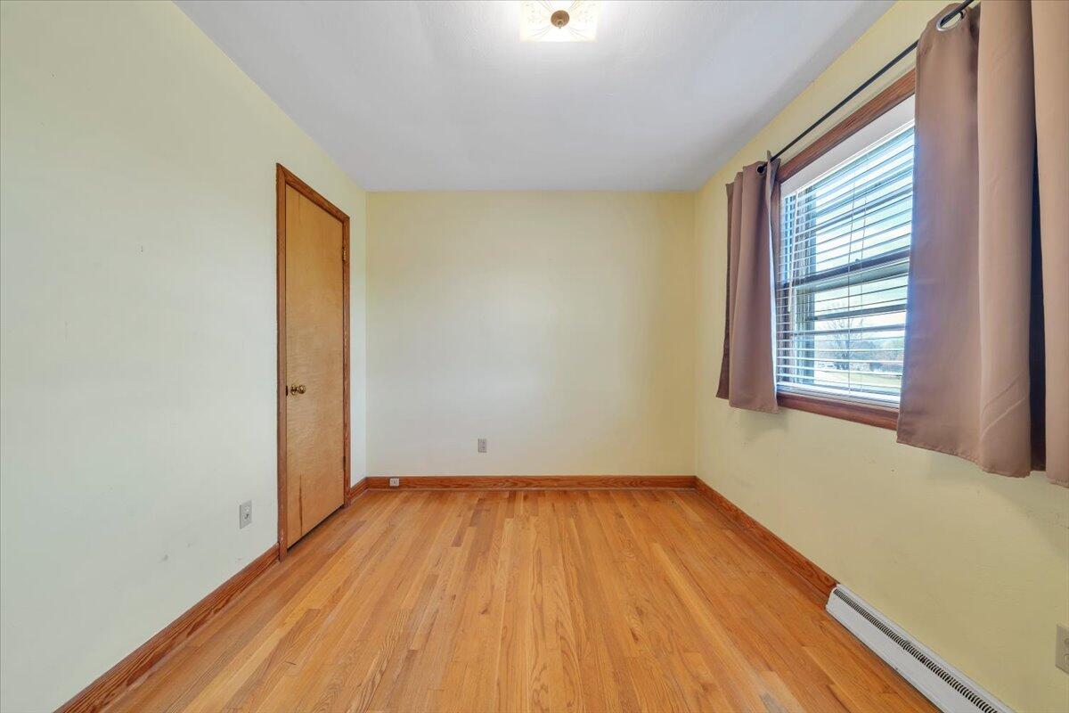 2515 Northminster Road Northwest Roanoke, VA 24012 - Photo 25 of 54 a view of a room with wooden floor and window