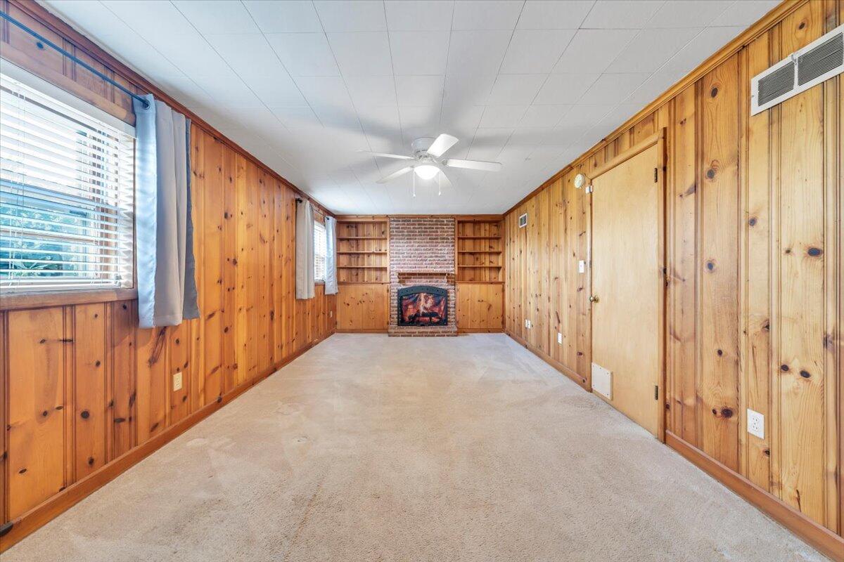 2515 Northminster Road Northwest Roanoke, VA 24012 - Photo 31 of 54 a view of a hallway with wooden floor and windows