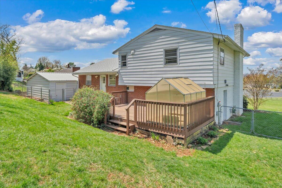 2515 Northminster Road Northwest Roanoke, VA 24012 - Photo 43 of 54 a view of a house with a yard and deck