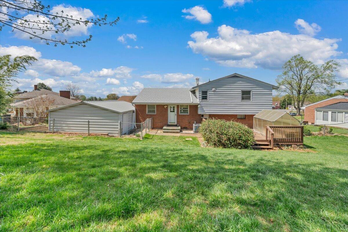 2515 Northminster Road Northwest Roanoke, VA 24012 - Photo 46 of 54 a front view of a house with a garden