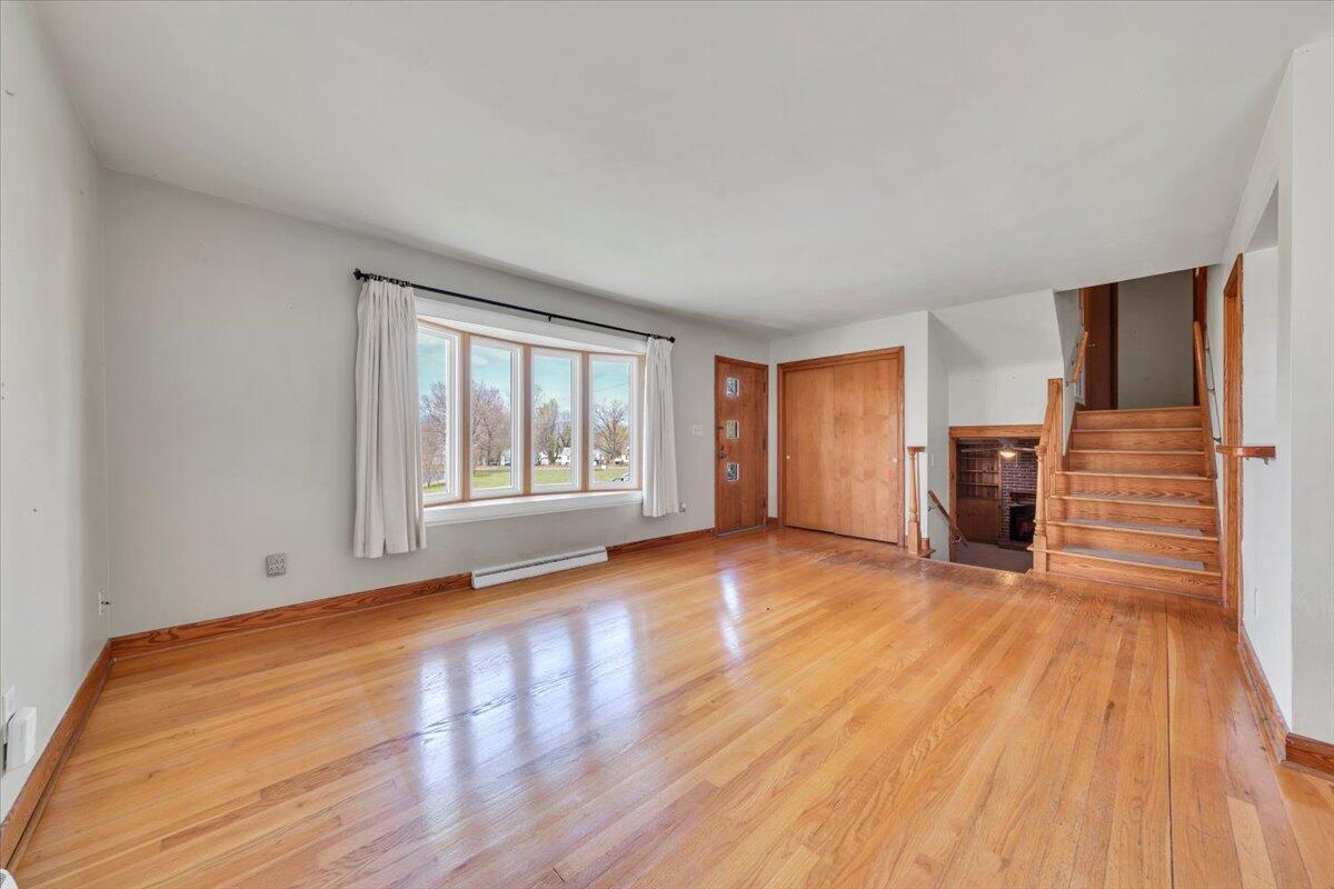 2515 Northminster Road Northwest Roanoke, VA 24012 - Photo 5 of 54 a view of empty room with wooden floor and fan