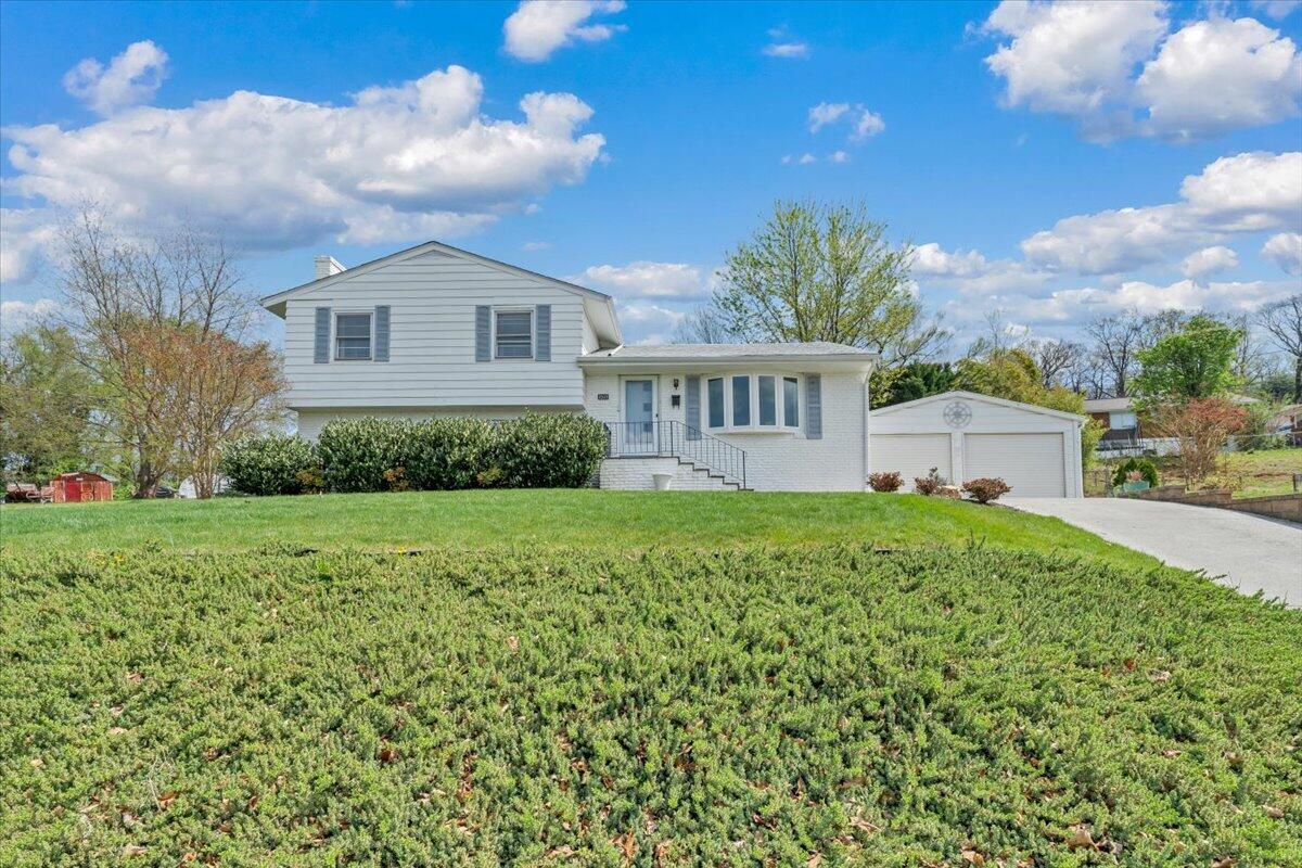 2515 Northminster Road Northwest Roanoke, VA 24012 - Photo 53 of 54 a front view of a house with a yard