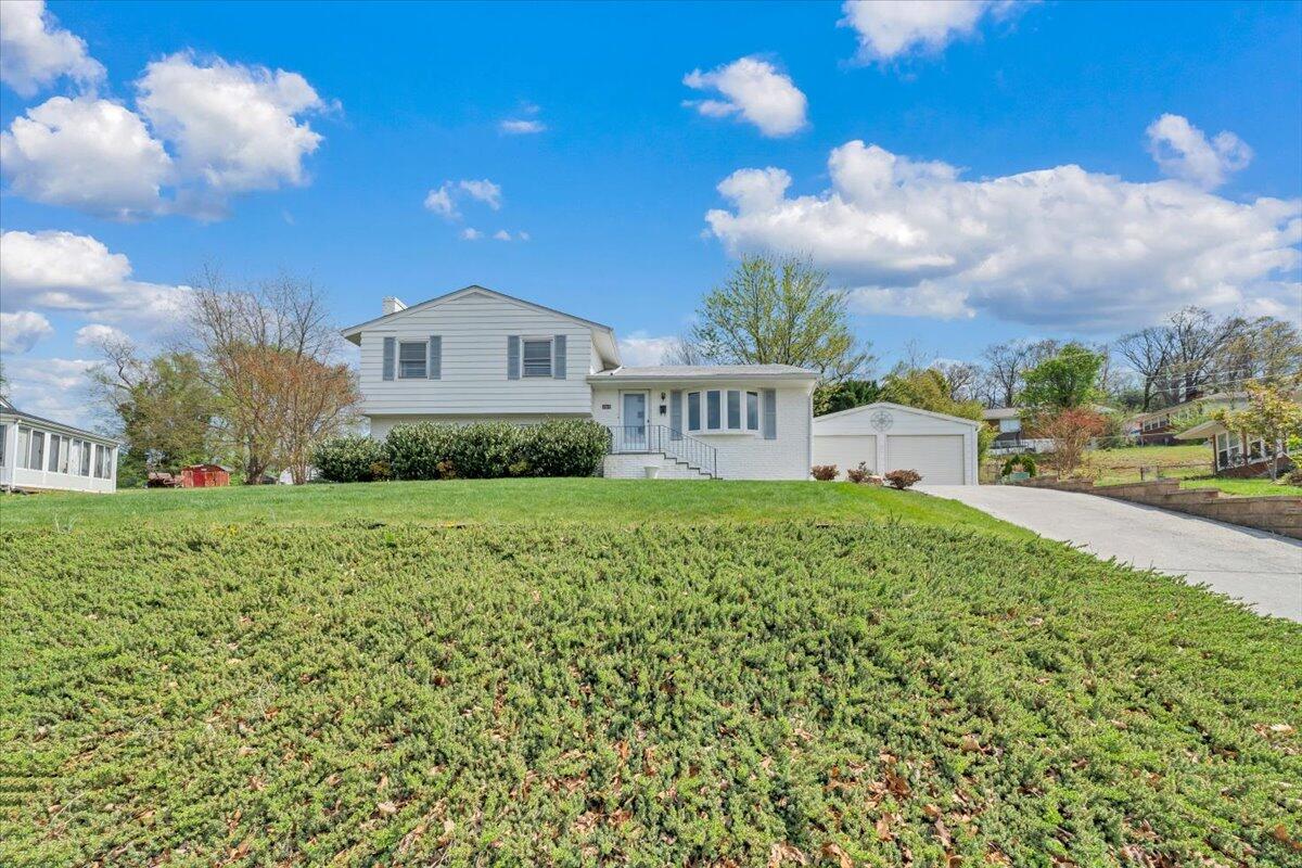 2515 Northminster Road Northwest Roanoke, VA 24012 - Photo 54 of 54 a front view of a house with a yard