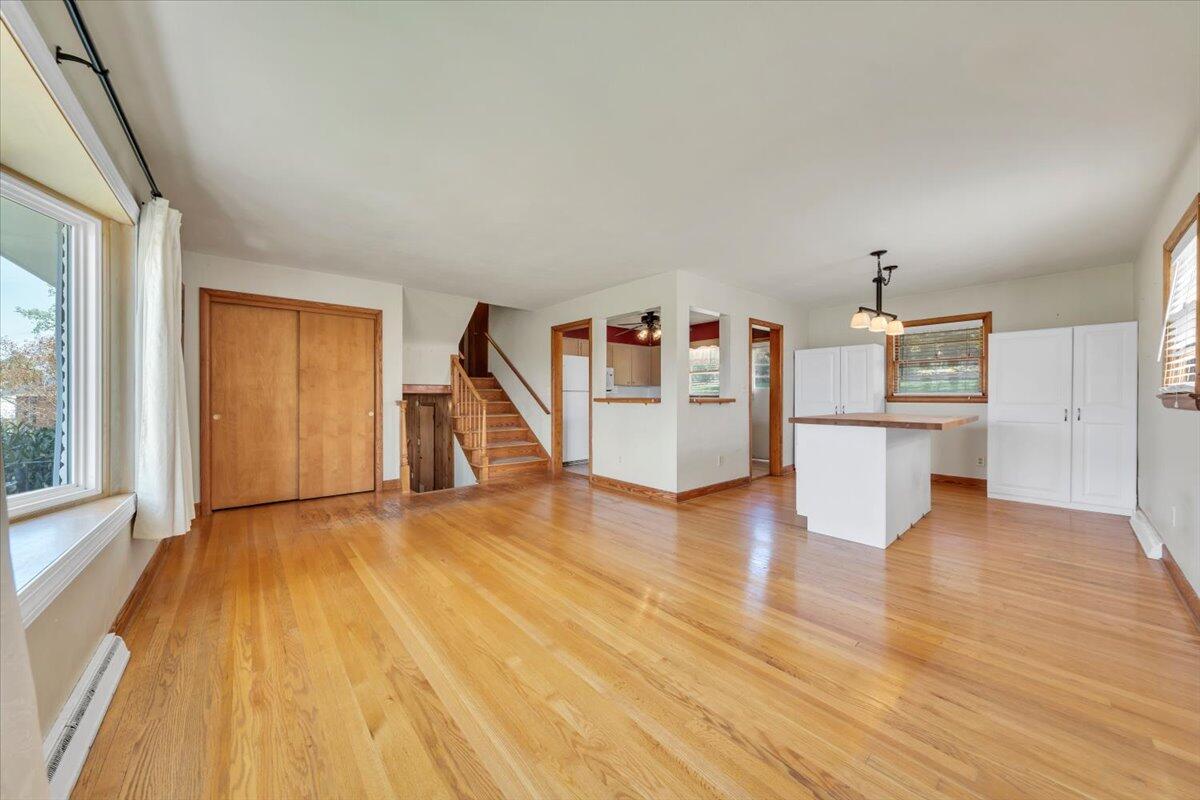 2515 Northminster Road Northwest Roanoke, VA 24012 - Photo 7 of 54 a view of a kitchen with wooden floor and a hallway