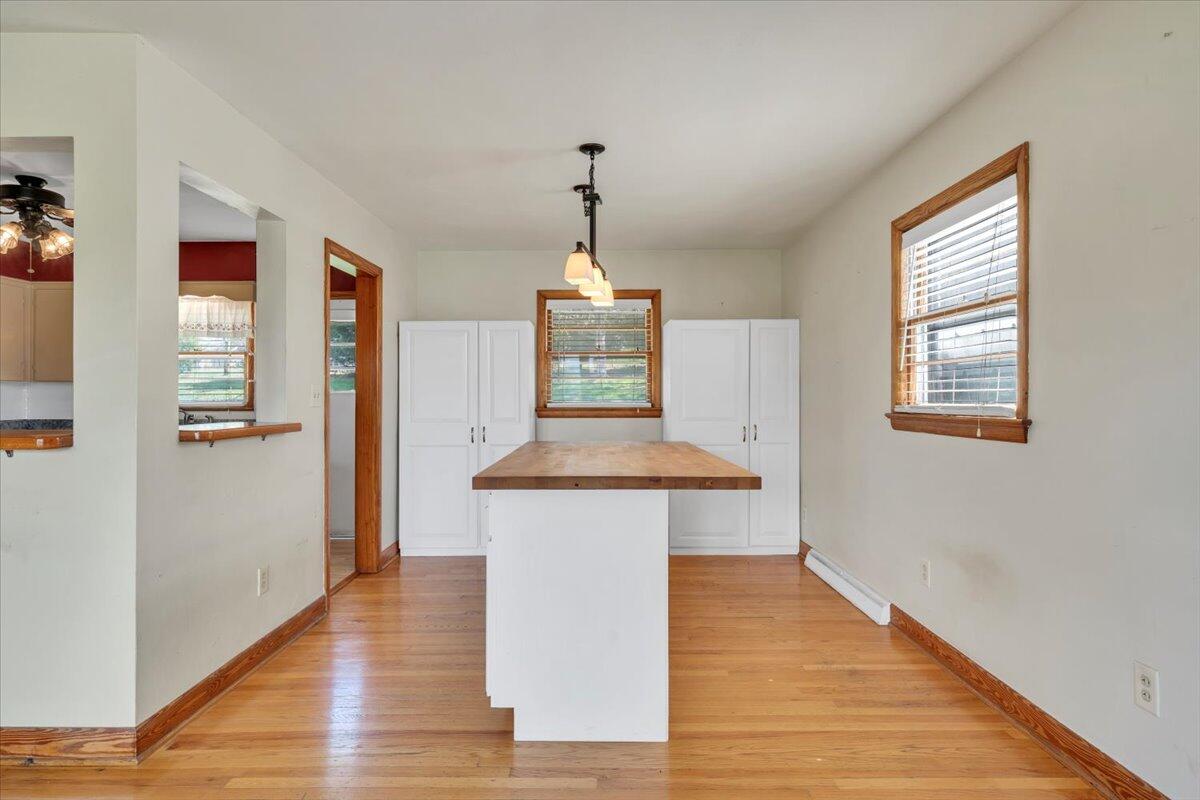 2515 Northminster Road Northwest Roanoke, VA 24012 - Photo 8 of 54 a view of a hallway with wooden floor windows and a living room