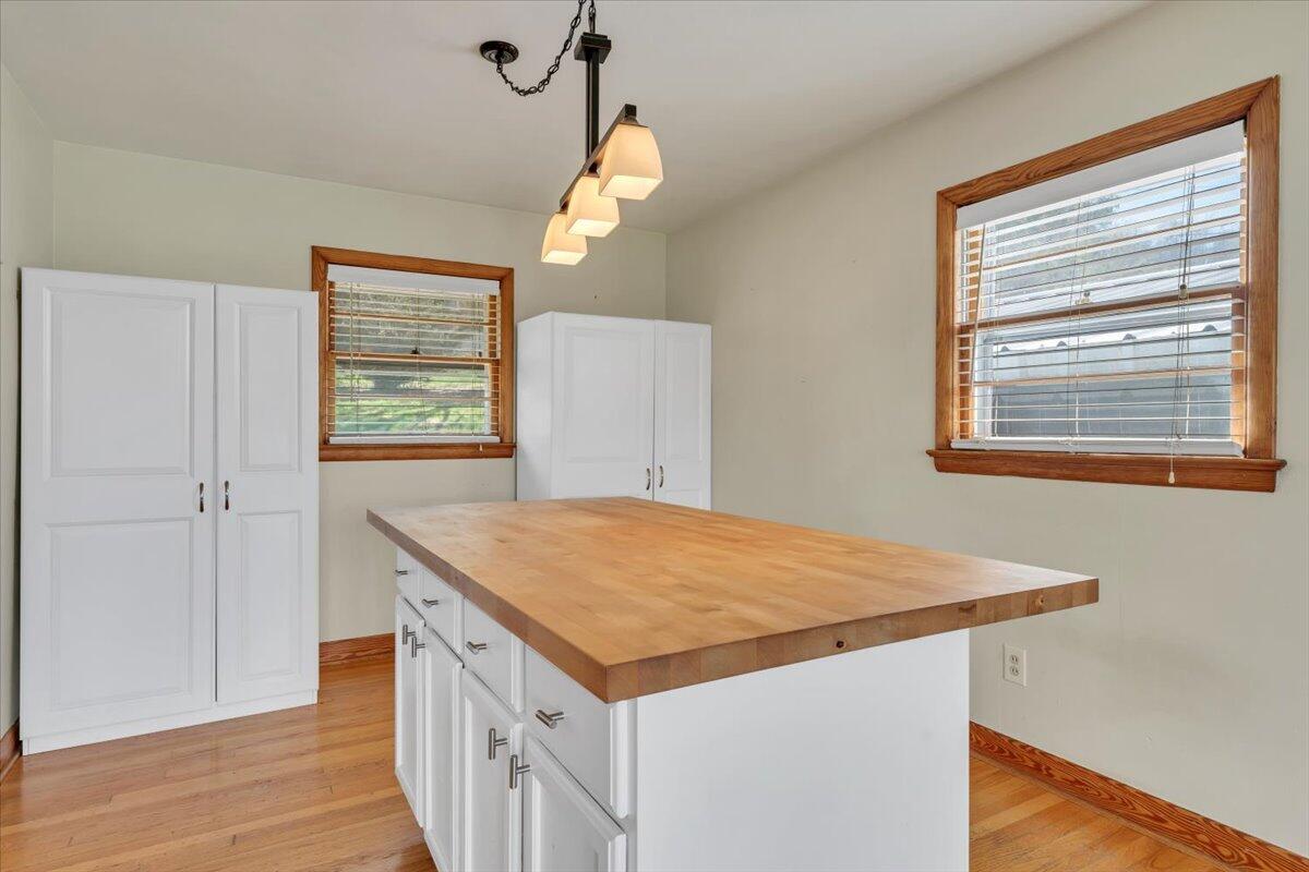 2515 Northminster Road Northwest Roanoke, VA 24012 - Photo 10 of 54 a kitchen that has a cabinets and wooden floor