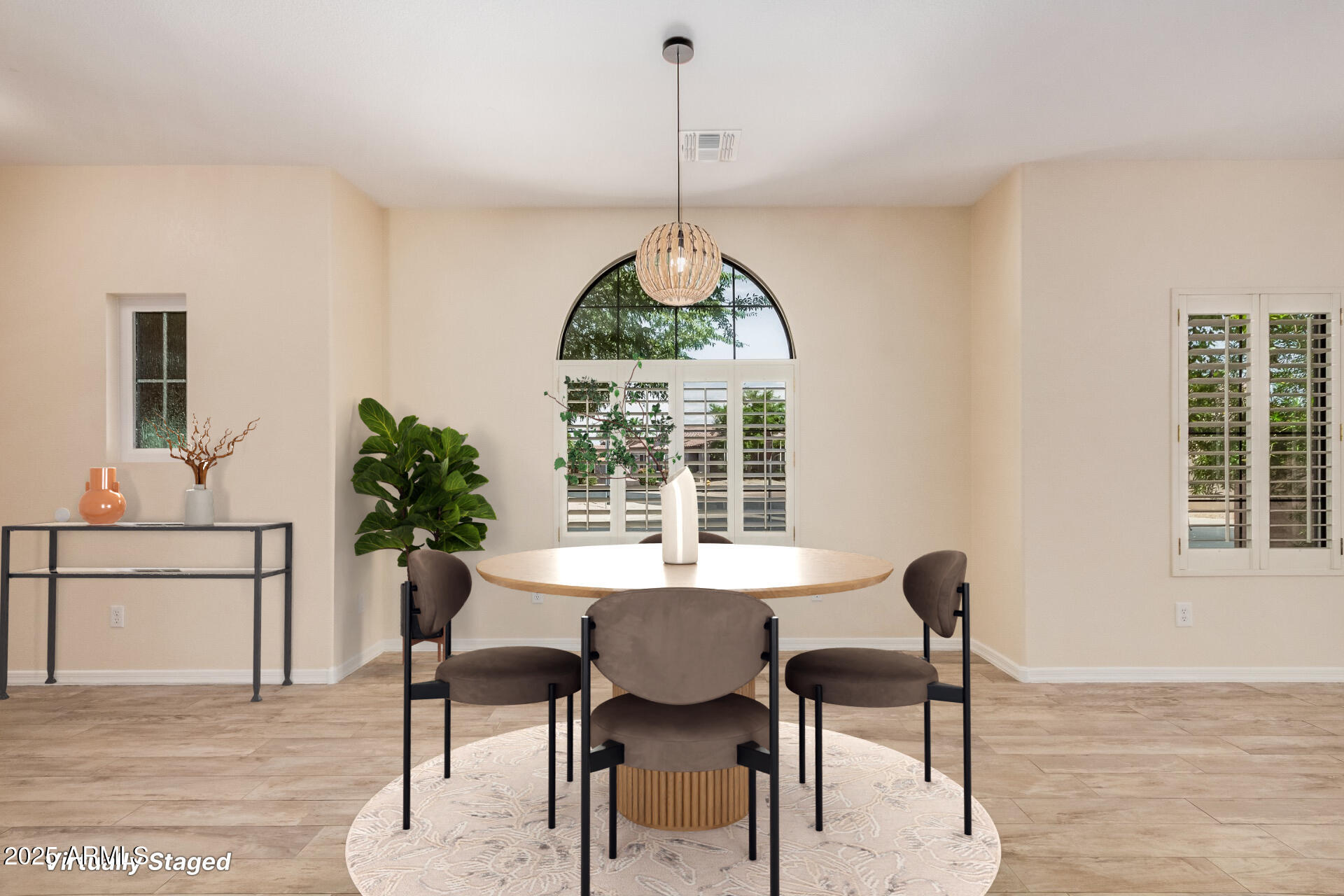3047 East Fremont Road Phoenix, AZ 85042 - Photo 8 of 36 a dining room with furniture and window