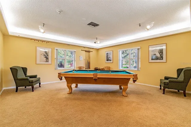 a room with lots of table and chairs