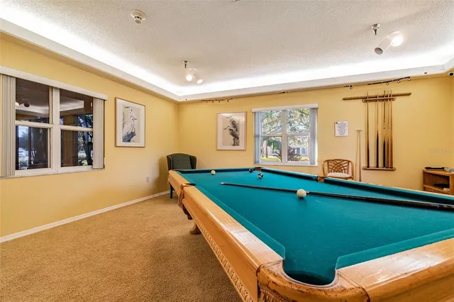 a view of a park with basketball court