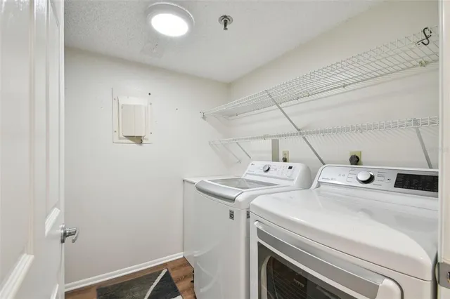 a utility room with dryer and washer