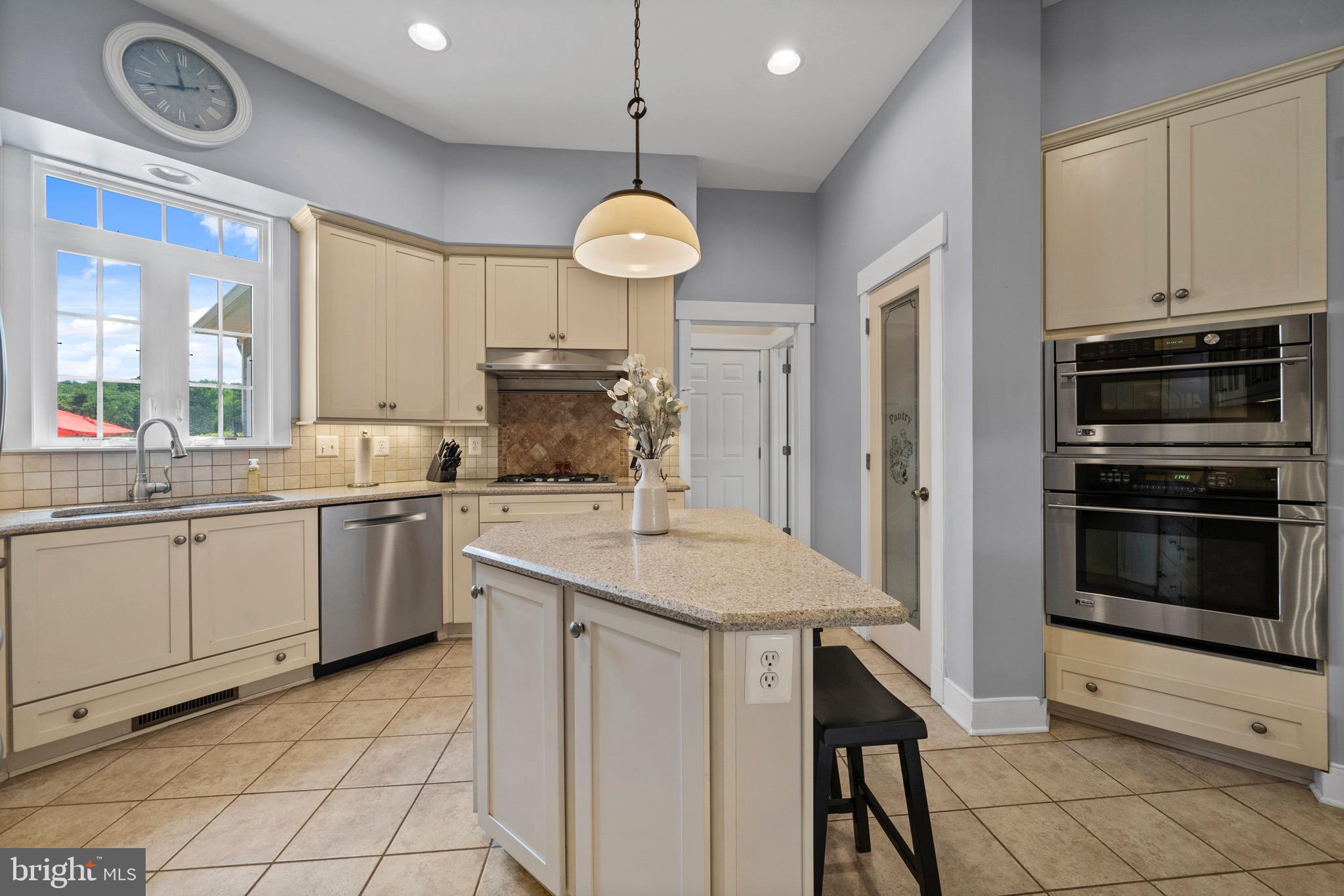 4160 Chaneyville Road Owings, MD 20736 - Photo 18 of 98 a kitchen with a sink cabinets and stainless steel appliances