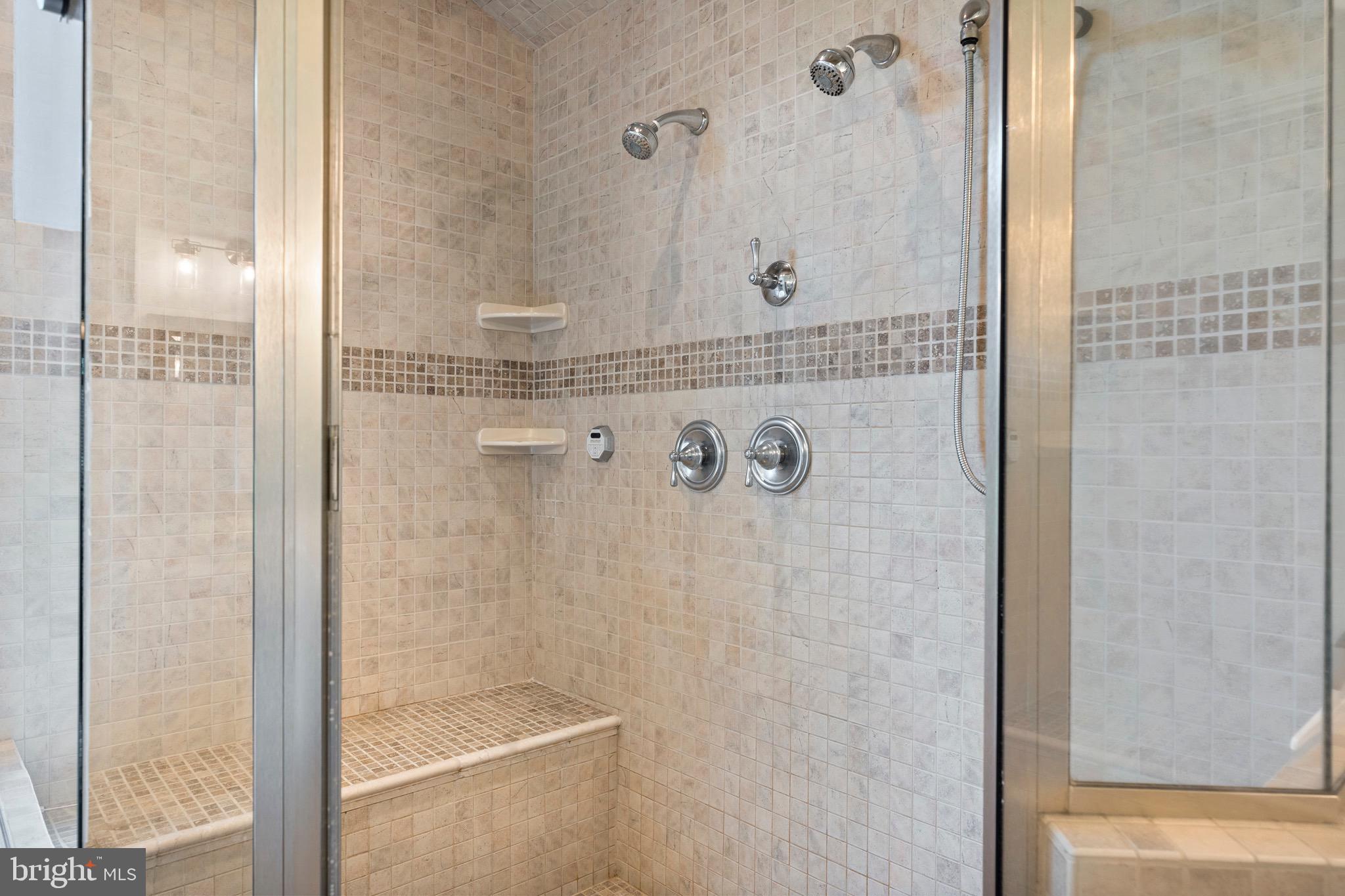 4160 Chaneyville Road Owings, MD 20736 - Photo 39 of 98 a bathroom with a glass shower door