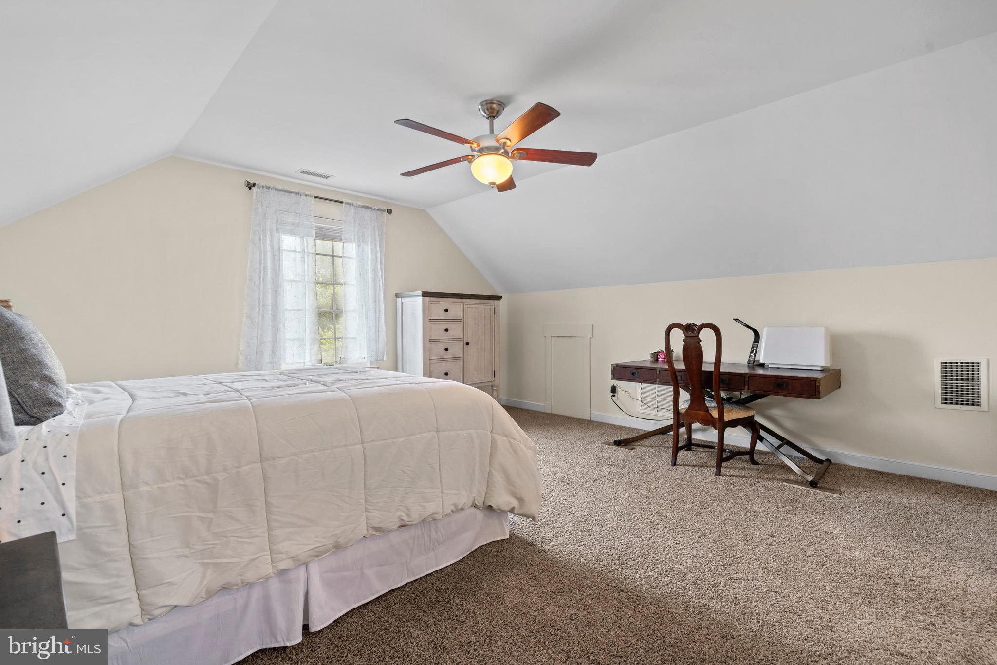 4160 Chaneyville Road Owings, MD 20736 - Photo 56 of 98 a bedroom with a bed a desk and chair