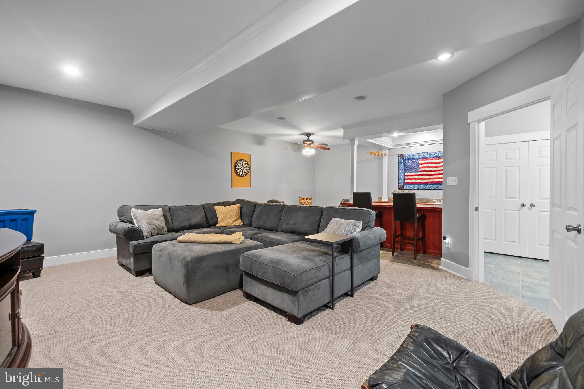 4160 Chaneyville Road Owings, MD 20736 - Photo 60 of 98 a living room with furniture and a ceiling fan