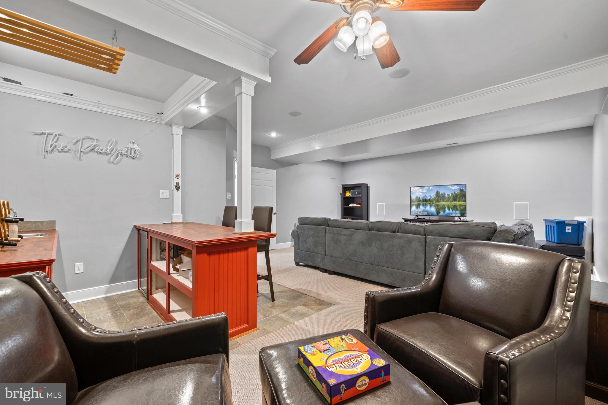 4160 Chaneyville Road Owings, MD 20736 - Photo 63 of 98 a living room with furniture and a wooden floor