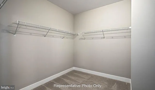 a view of small space with racks on the wall