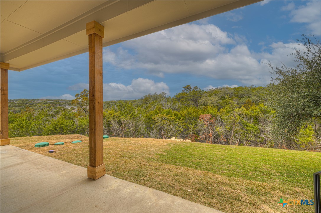 328 Compass Rose Spring Branch, TX 78070 - Photo 41 of 48 a view of a yard with an outdoor space