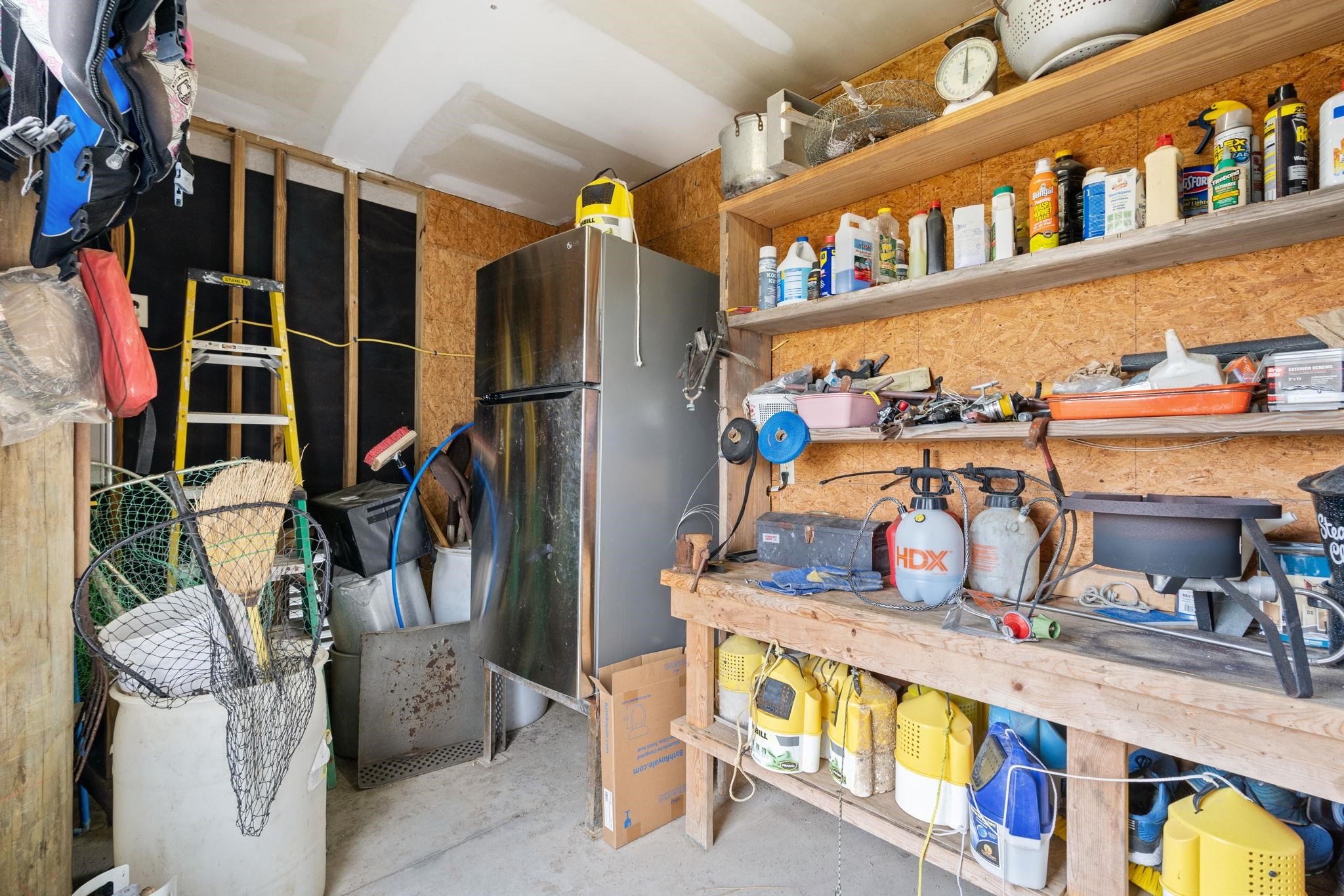 187 Myrtle Avenue Pawleys Island, SC 29585 - Photo 19 of 43 Storage w/ Refrigerator & Tankless H2O Heater