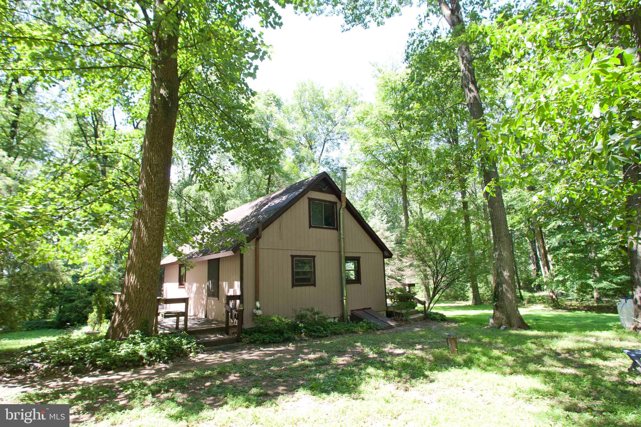 279 County Line Road Riegelsville, PA 18077 - Photo 1 of 24 a front view of a house with a yard