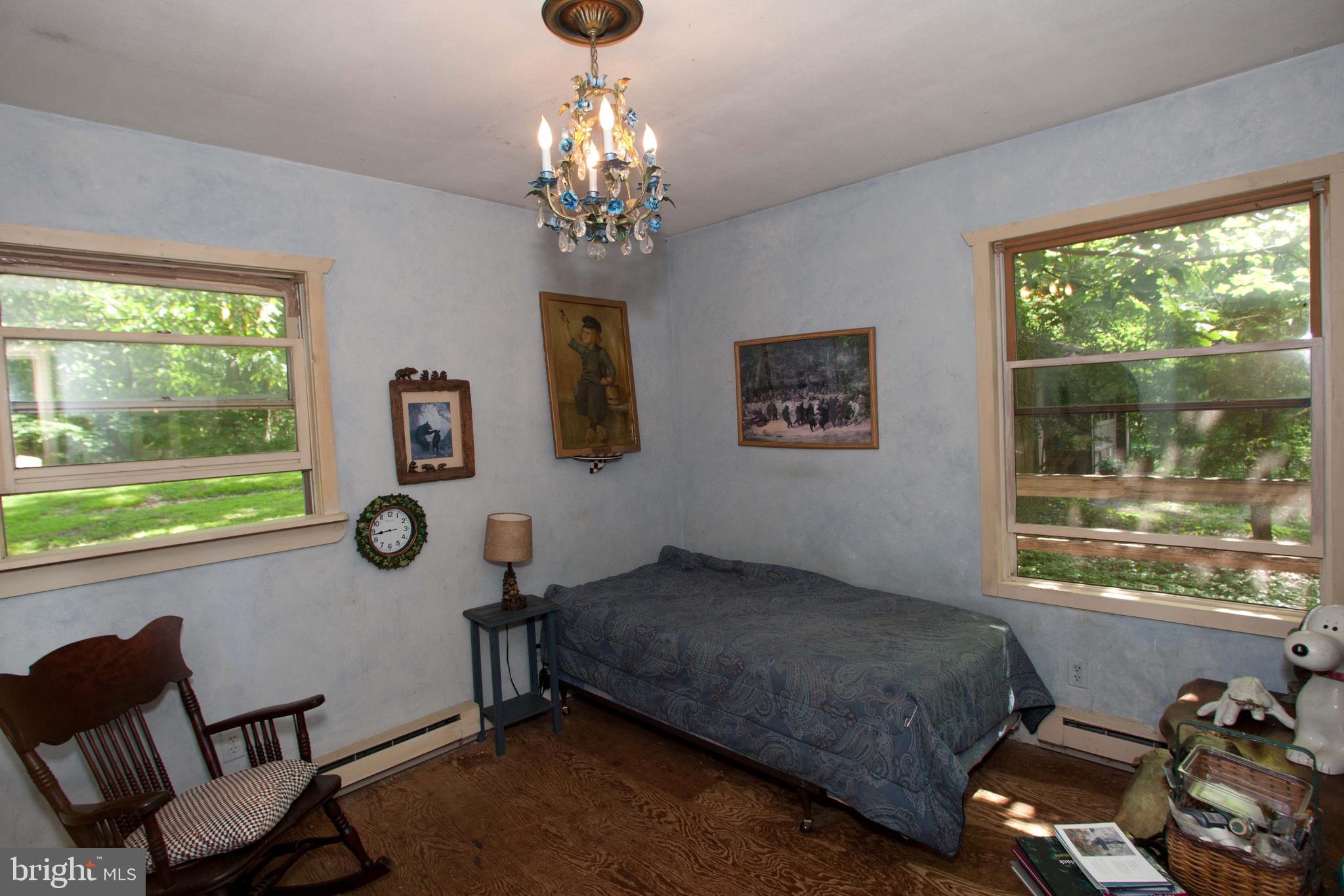 279 County Line Road Riegelsville, PA 18077 - Photo 13 of 24 a bedroom with a bed window and chair