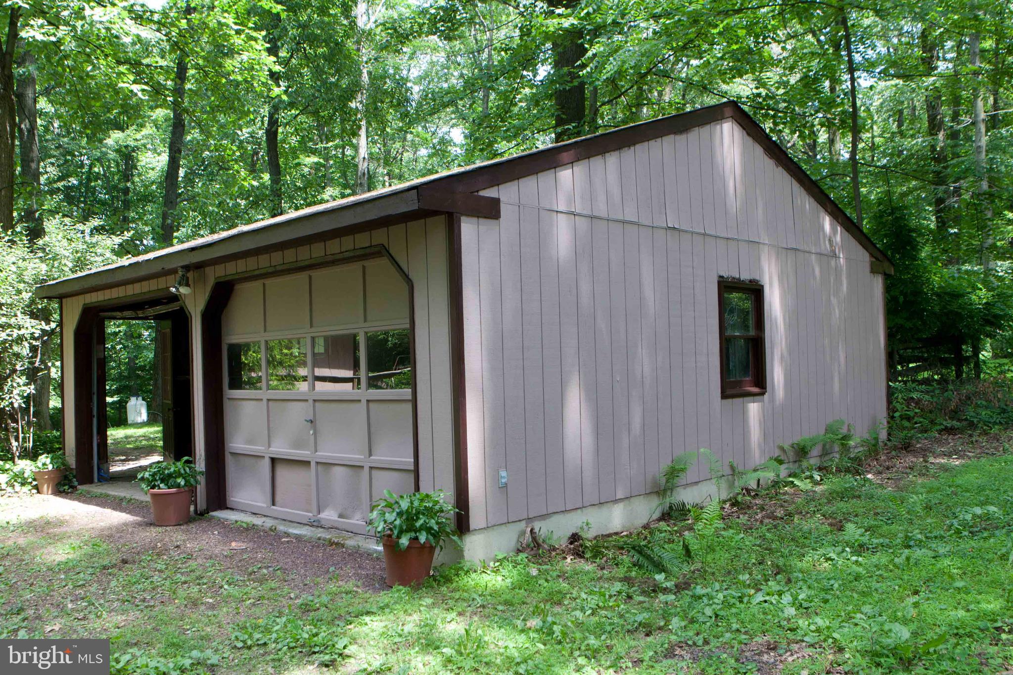 279 County Line Road Riegelsville, PA 18077 - Photo 18 of 24 a view of a house with backyard and garden