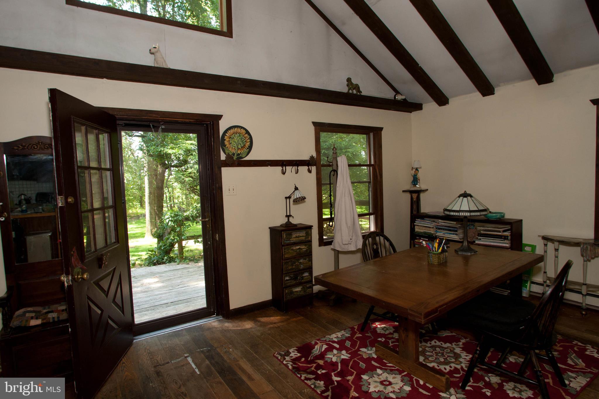 279 County Line Road Riegelsville, PA 18077 - Photo 6 of 24 a view of a dining room with furniture window and outside view